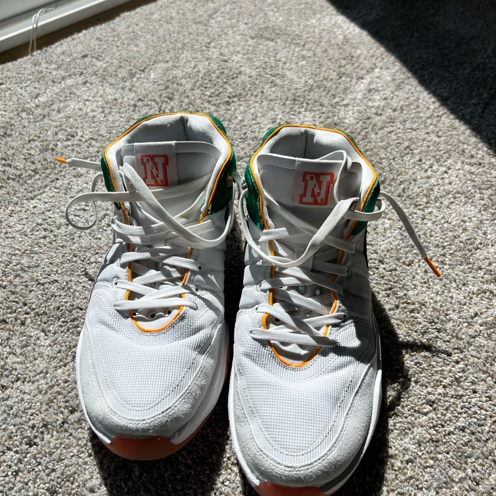 Nike G.T. Hustle 2 basketball shoes  with orange and green accents